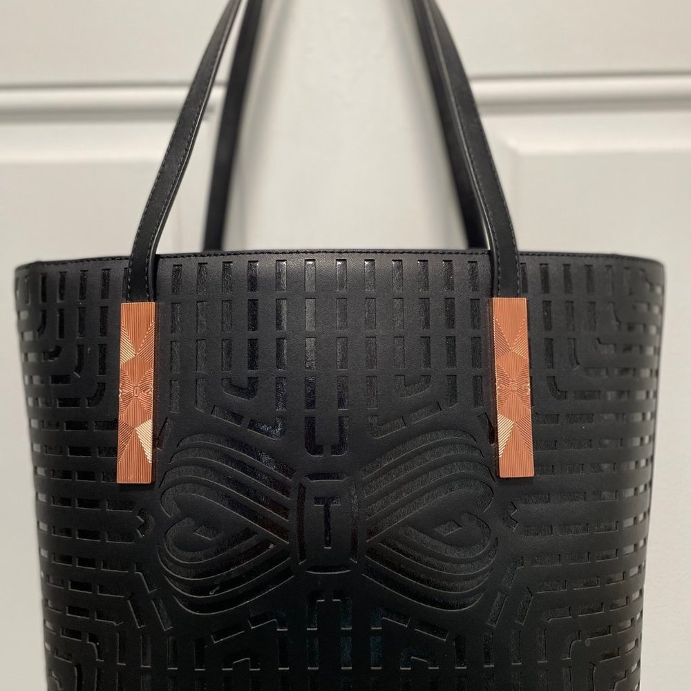 Ted Baker pierced leather bag. Fabulous condition. A dust bag will be included.
